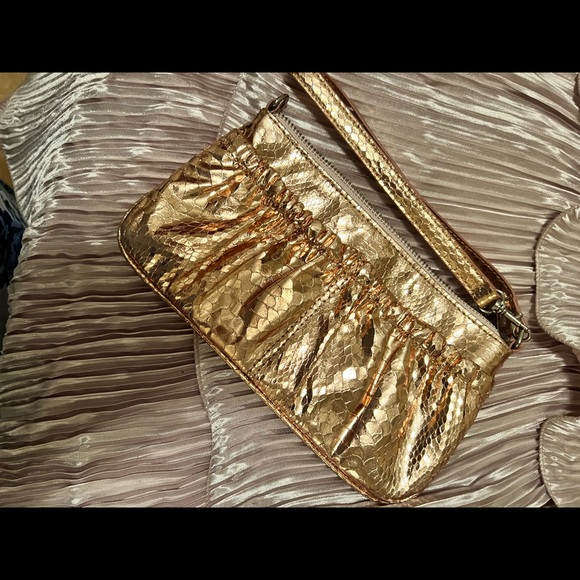 NWOT rose gold clutch